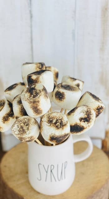 Faux Marshmallows with a skewer, toasted fake marshmallow