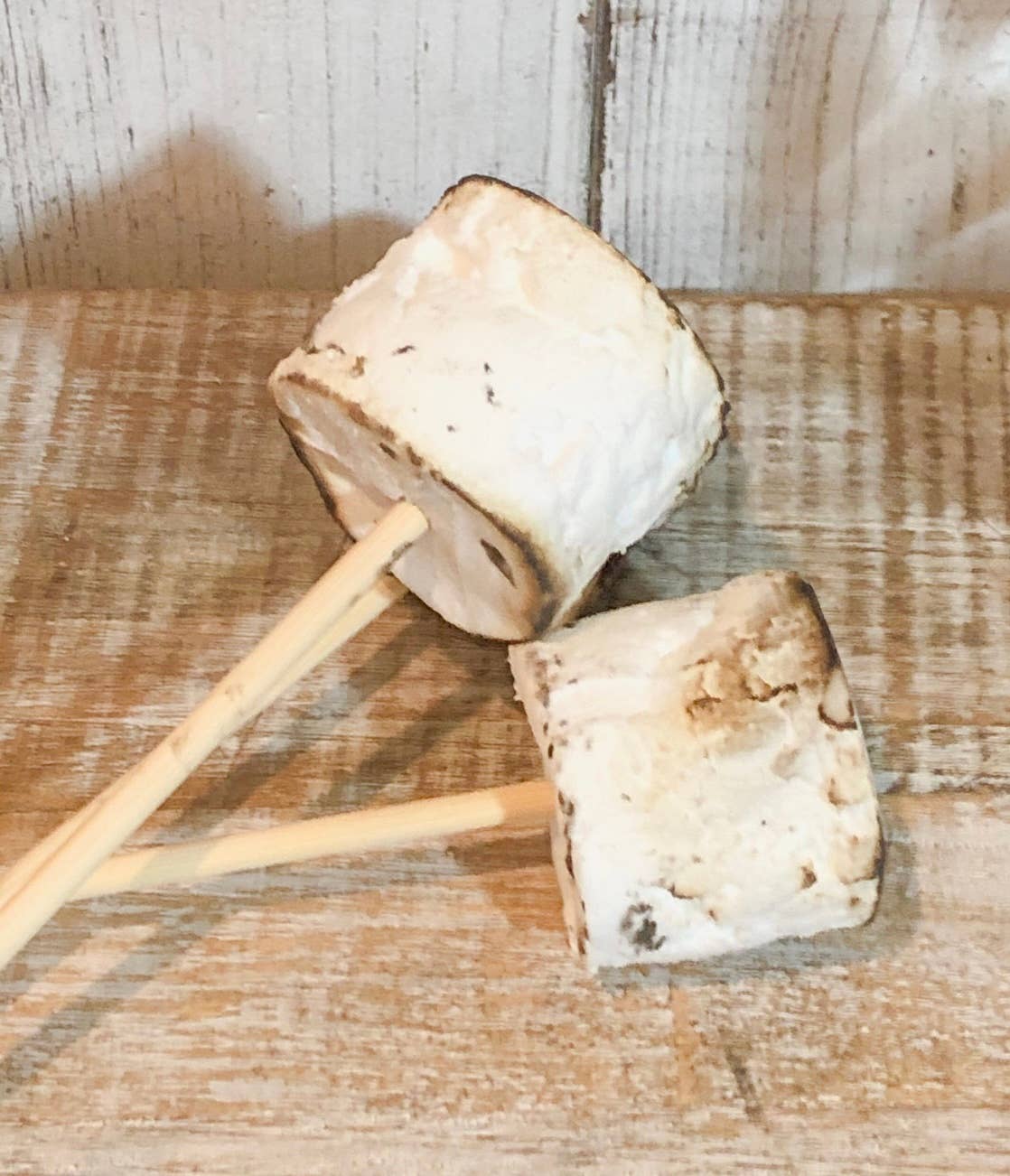 Faux Marshmallows with a skewer, toasted fake marshmallow