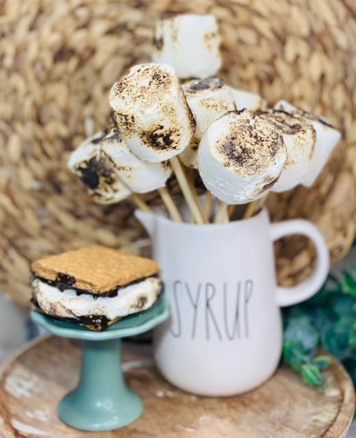 Faux Marshmallows with a skewer, toasted fake marshmallow